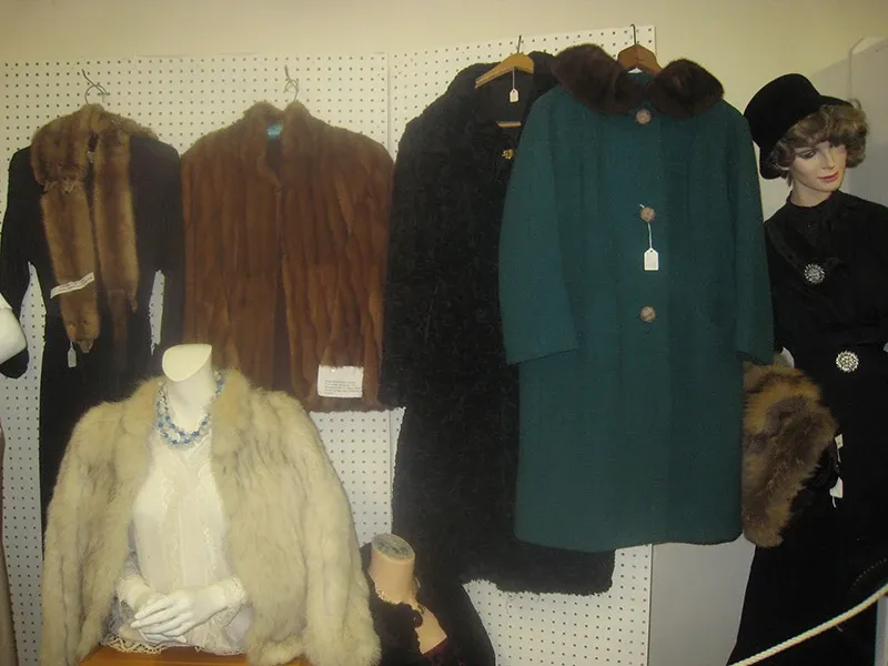 Coats, furs and hats displayed on mannequins