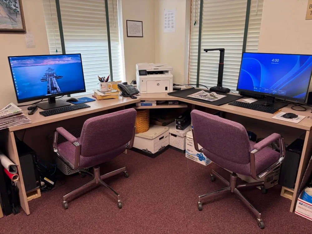 Computer workstations, a printer and a document scanner in the research center